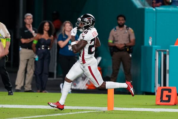 Atlanta Falcons' Dee Alford (20) returns a punt for a touchdown in the second half of a preseason NFL football game, Friday, Aug. 11, 2023, in Miami Gardens, Fla. (AP Photo/Marta Lavandier)