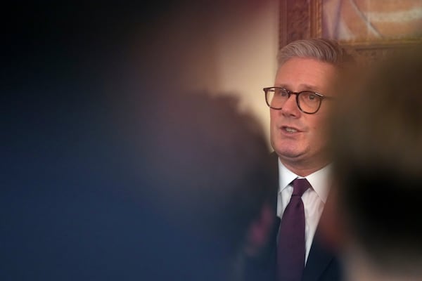 Britain's Prime Minster Keir Starmer speaks to guests as he holds a reception on the third anniversary of Russia's invasion of Ukraine in London, Monday, Feb. 24, 2025. (AP Photo/Frank Augstein, Pool)