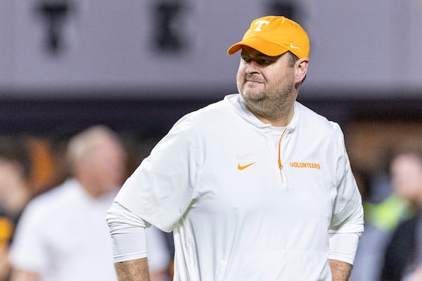 Tennessee head coach Josh Heupel watches his players warmup before an NCAA college football game against Kentucky, Saturday, Nov. 2, 2024, in Knoxville, Tenn. (AP Photo/Wade Payne)