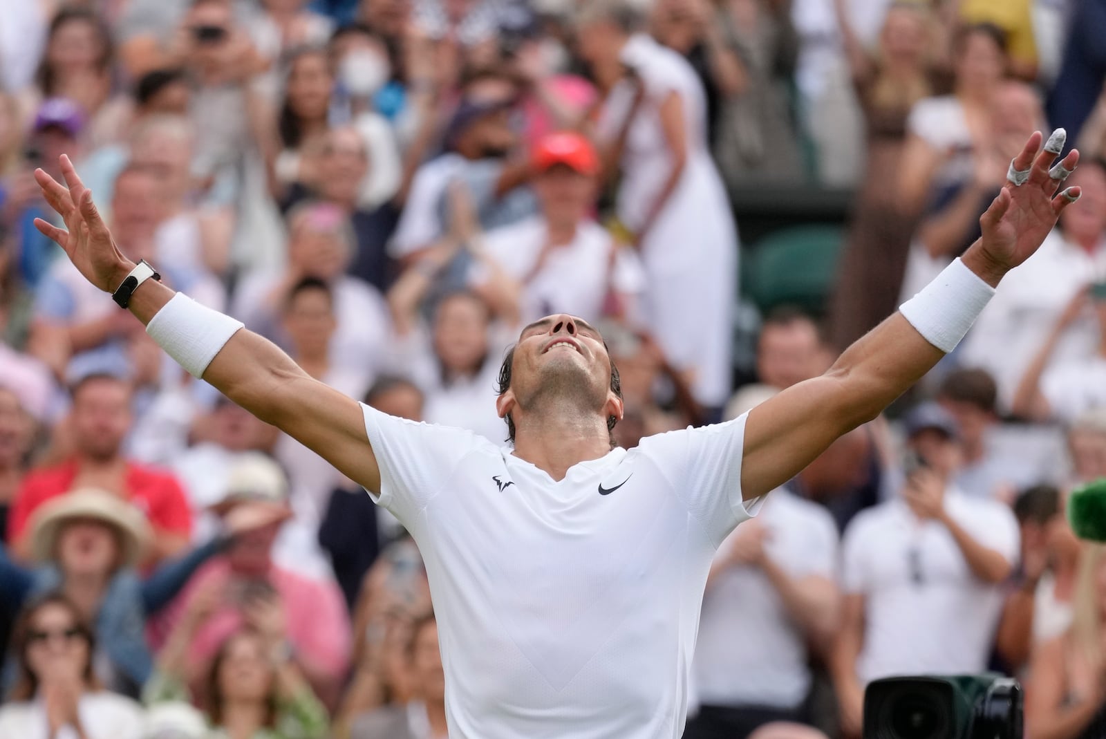 FILE - Spain's Rafael Nadal celebrates after beating Taylor Fritz of the US in a men's singles quarterfinal match on day ten of the Wimbledon tennis championships in London, Wednesday, July 6, 2022, as he announced he will retire from tennis at age 38 following the Davis Cup finals in November. (AP Photo/Kirsty Wigglesworth, File)