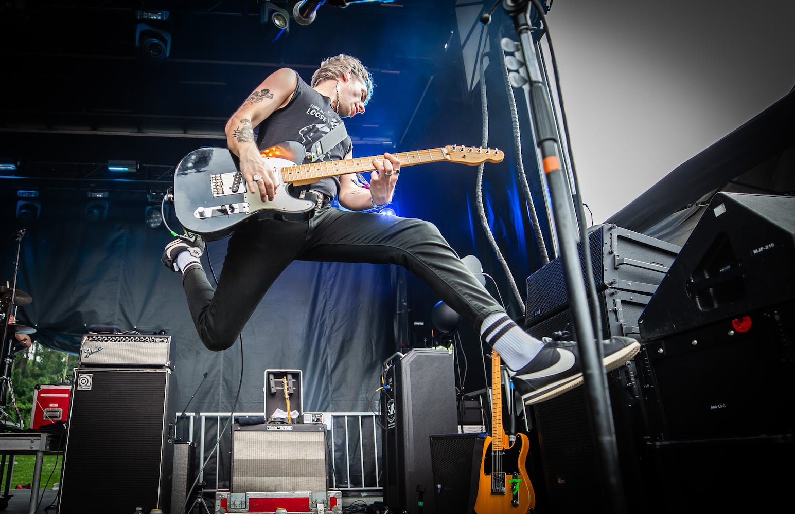 Atlanta, Ga: Bad Nerves killed with high flying acrobats and punk songs to an audience of crowd-surfing fanatics. Photo taken Saturday May 4, 2024 at Central Park, Old 4th Ward.  (RYAN FLEISHER FOR THE ATLANTA JOURNAL-CONSTITUTION)