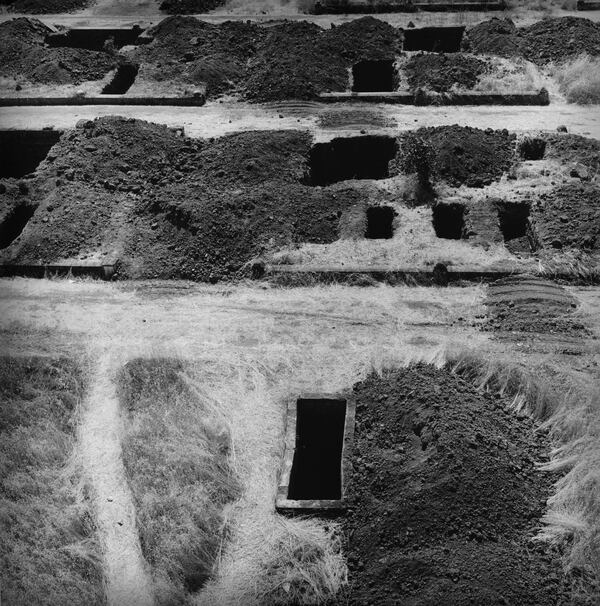 "The Graves Have Been Disinterred, Monticello Cemetery is Moved to Higher Ground," (1956) by Pirkle Jones.
(Courtesy of Regents of the University of California / Booth Western Art Museum)