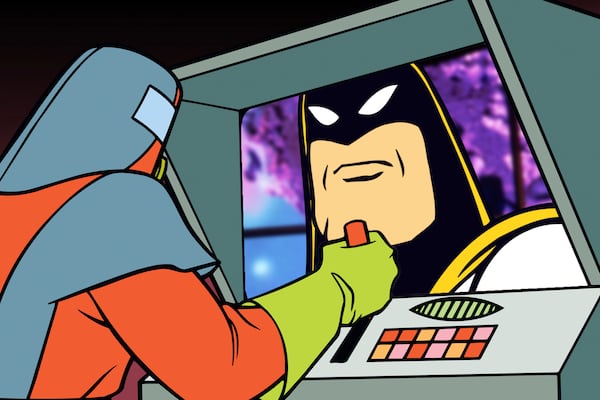 This image released by Adult Swim shows the animated superhero Space Ghost, voiced by George Lowe, right, in a scene from the series “Space Ghost Coast to Coast." (Adult Swim via AP)