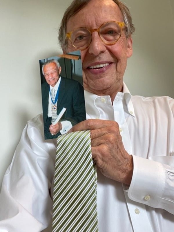 Bill King with C.T. Vivian's favorite tie. (Courtesy of Bill King)