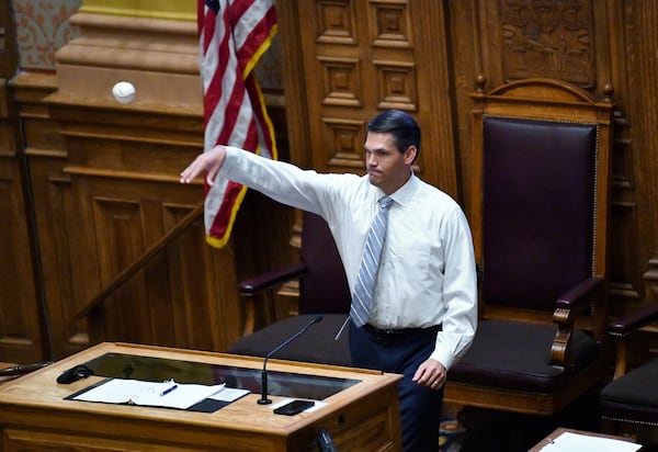 Then-Lieutenant Governor Geoff Duncan throws a baseball to Georgia Tech's Jamie Taylor as the last day of the legislative session begins in the Senate Chambers at the Georgia State Capitol building in Atlanta on Wednesday, March 31, 2021. (Hyosub Shin / Hyosub.Shin@ajc.com)