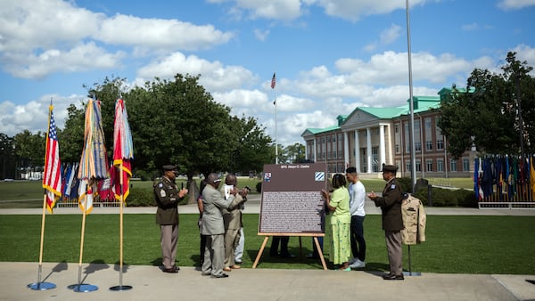 FORT STEWART, GA - MAY 20, 2021: Third Infantry Division leaders and members of Sgt. 1st Class Alwyn Cashe's family unveil a sign honoring his bravery. (AJC Photo/Stephen B. Morton)