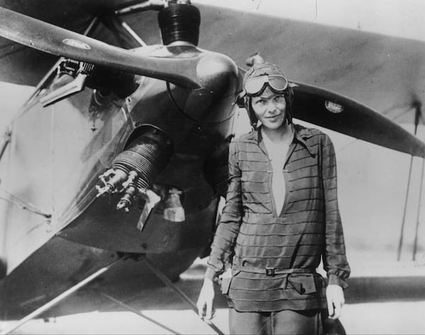 394033 03: (FILE PHOTO) Amelia Earhart stands June 14, 1928 in front of her bi-plane called "Friendship" in Newfoundland. Carlene Mendieta, who is trying to recreate Earhart's 1928 record as the first woman to fly across the US and back again, left Rye, NY on September 5, 2001. Earhart (1898 - 1937) disappeared without trace over the Pacific Ocean in her attempt to fly around the world in 1937. (Photo by Getty Images)