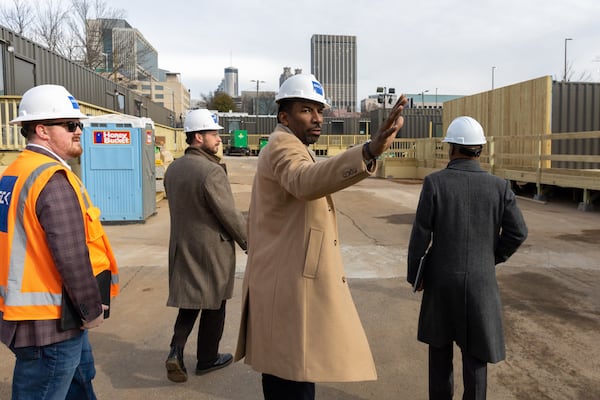 Atlanta Mayor Andre Dickens tours 184 Forsyth Street, a development of shipping containers repurposed into housing for unhoused people, in Atlanta on Friday, December 22, 2023. (Arvin Temkar / arvin.temkar@ajc.com)