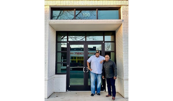 Duane Nutter (left) and partner Reggie Washington are seen in front of their forthcoming Summerhill restaurant, Southern National. Courtesy of Southern National