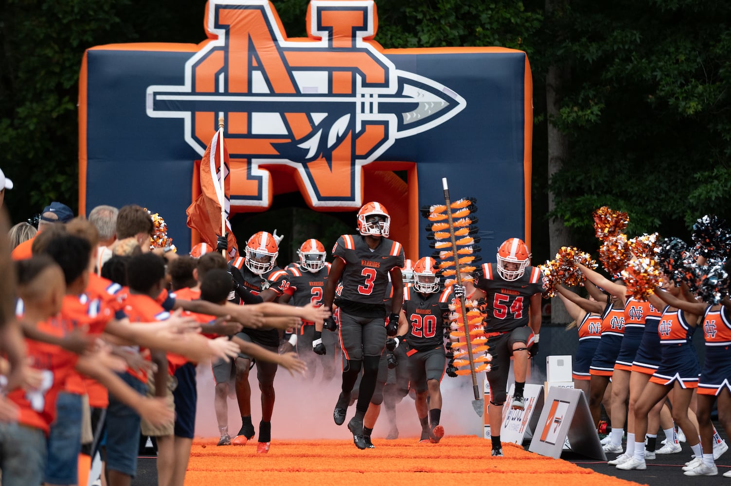 North Cobb players emerge from the tunnel prior to the Buford at North Cobb football game Friday night, September 1, 2023. (Jamie Spaar for the Atlanta Journal Constitution)