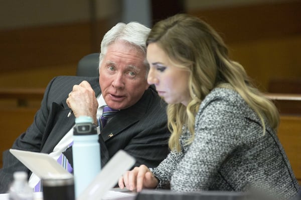 04/10/2018 — Atlanta, GA - Claud “Tex” McIver, left, speaks with his defense attorney, Amanda Clark Palmer, right. ALYSSA POINTER/ALYSSA.POINTER@AJC.COM