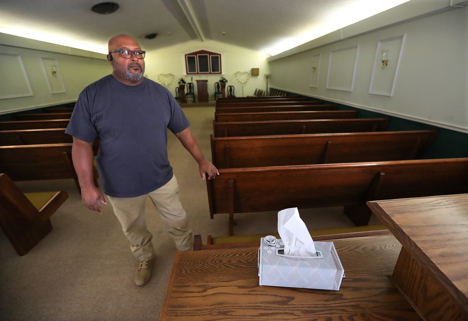 April 22, 2020 Forsyth: John Freeman Jr., owner of Freeman Funeral Home, stands in his chapel warning that opening up the economy is going to make him a rich man to which he is opposed on Wednesday, April 22, 2020, in Forsyth. The Monroe County Commission recently voted to urge Gov. Brian Kemp and President Donald Trump to begin reopening the economy by the end of the month, becoming one of the first local Georgia governments to formally demand a speedier end to coronavirus restrictions.   Curtis Compton ccompton@ajc.com