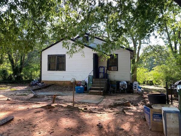 Atlanta police found nine bullet holes in the front wall of the Henry Aaron Avenue home, according to a report.