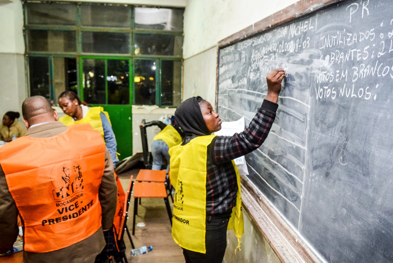 Vote counting gets underway at a polling station in Maputo, Mozambique, in general elections Wednesday, Oct. 9, 2024. (AP Photo/Carlos Uqueio)