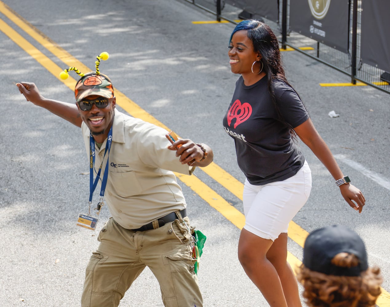 Fans dance to the music of DJ Envy.  (Bob Andres for the Atlanta Journal Constitution)