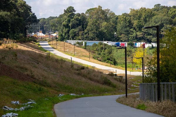 10/13/2021 — Atlanta, Georgia — The Southside trial of the Atlanta BeltLine in the Pittsburgh community of Atlanta, Wednesday, October 13, 2021. Mayor Keisha Lance Bottoms gathered with leaders from the Beltline, city and community for a ribbon-cutting of the newly paved Southside Trail Tuesday morning. The mixed-use path runs for 0.8 miles from the existing Westside Trail at the end of University Avenue to Pittsburgh Yards, just west of the I-75/85 overpass. (Alyssa Pointer/ Alyssa.Pointer@ajc.com)