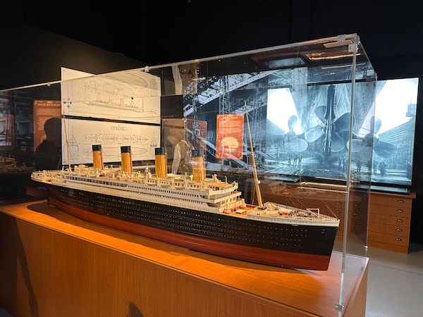 Early in the "Titanic: An Immersive Voyage," there are rooms focused on how the Titanic was built and includes a detailed miniaturized version of the ship itself. RODNEY HO/rho@ajc.com