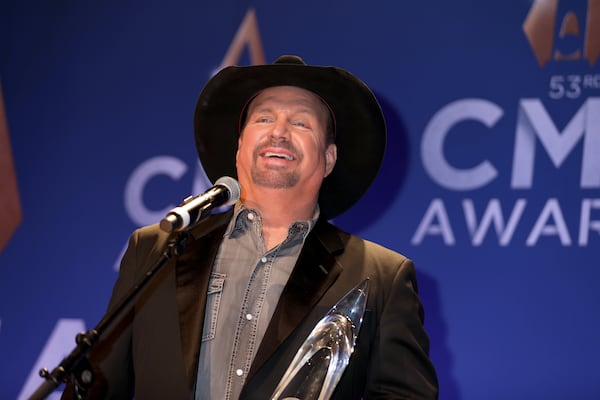 Garth Brooks poses with the CMA Award for Entertainer of the Year at the press room of the 53rd annual CMA Awards at the Bridgestone Arena on November 13, 2019 in Nashville, Tennessee. (Photo by Leah Puttkammer/Getty Images)