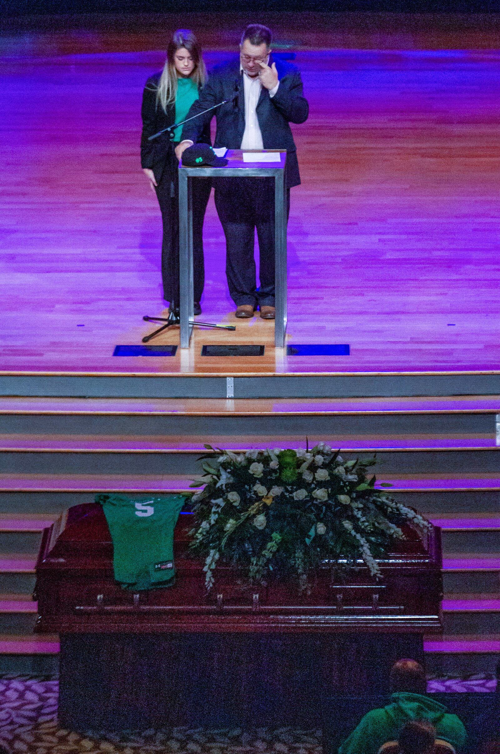   Robbie Roper's sister and father, James and Breanna Roper, speak at his funeral at the First Baptist Church of Woodstock Tuesday, Dec. 28, 2021. STEVE SCHAEFER FOR THE ATLANTA JOURNAL-CONSTITUTION