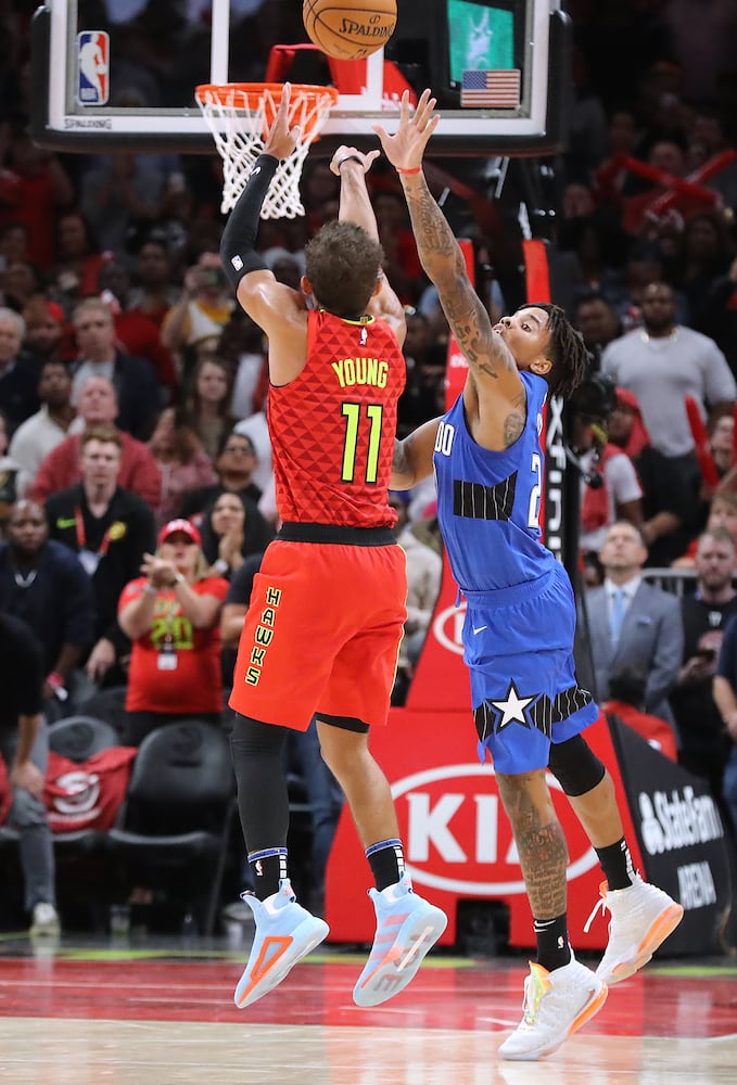 Photos: Hawks edge Magic in home opener