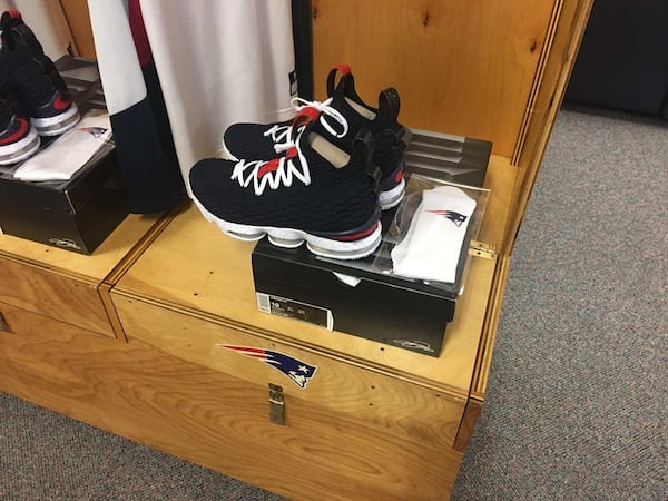 After surprising Berkmar High School's basketball team during a Tuesday practice, Quavo gave Berkmar High School's 14 varsity boys' basketball team members custom LeBron 15 basketball shoes.