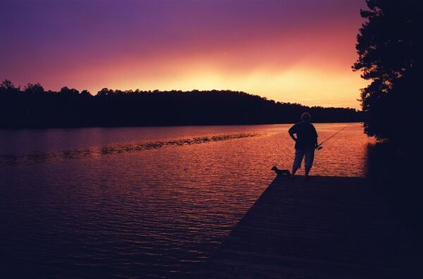 A glorious sunset such as this one could cap off your day at Fort Yargo State Park. AJC FILE PHOTO 2001