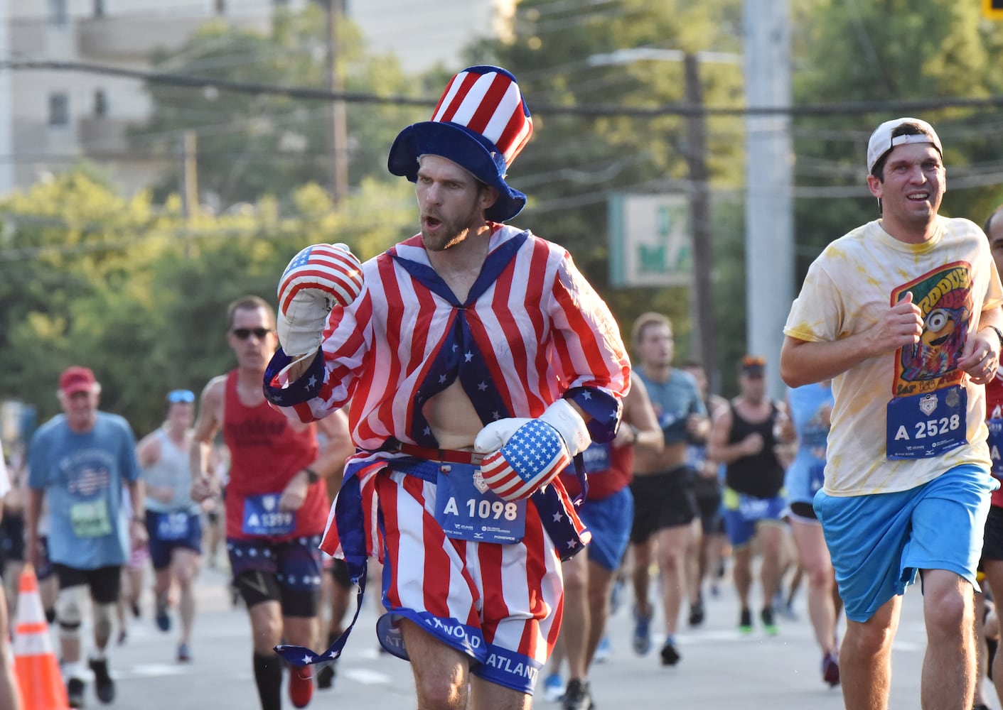 Runners show fashion flair during AJC Peachtree Road Race