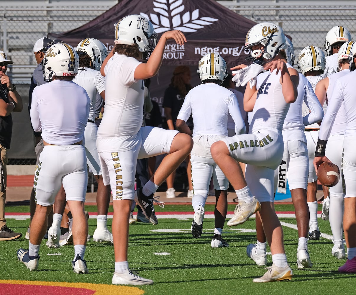 Players performing the end of their handshake before the game.
Apalachee High School returned to the field against Athens Clarke Central Saturday September 28, 2024 in their first game since the school schooting earlier in the month.

 Nell Carroll for the Journal Constitution