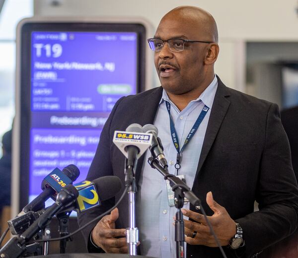 Melvin Johnson talks at a press conference at the new Concourse T extension at Hartsfield-Jackson Atlanta International Airport Tuesday, December 13, 2022. (Steve Schaefer/steve.schaefer@ajc.com)