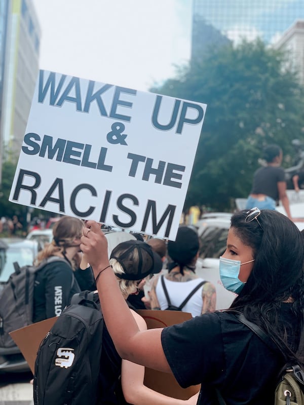 Kaysey Clayton, 26, attended the protests on Friday at Centennial Olympic Park. For her and many others, the protests were about more than police brutality.