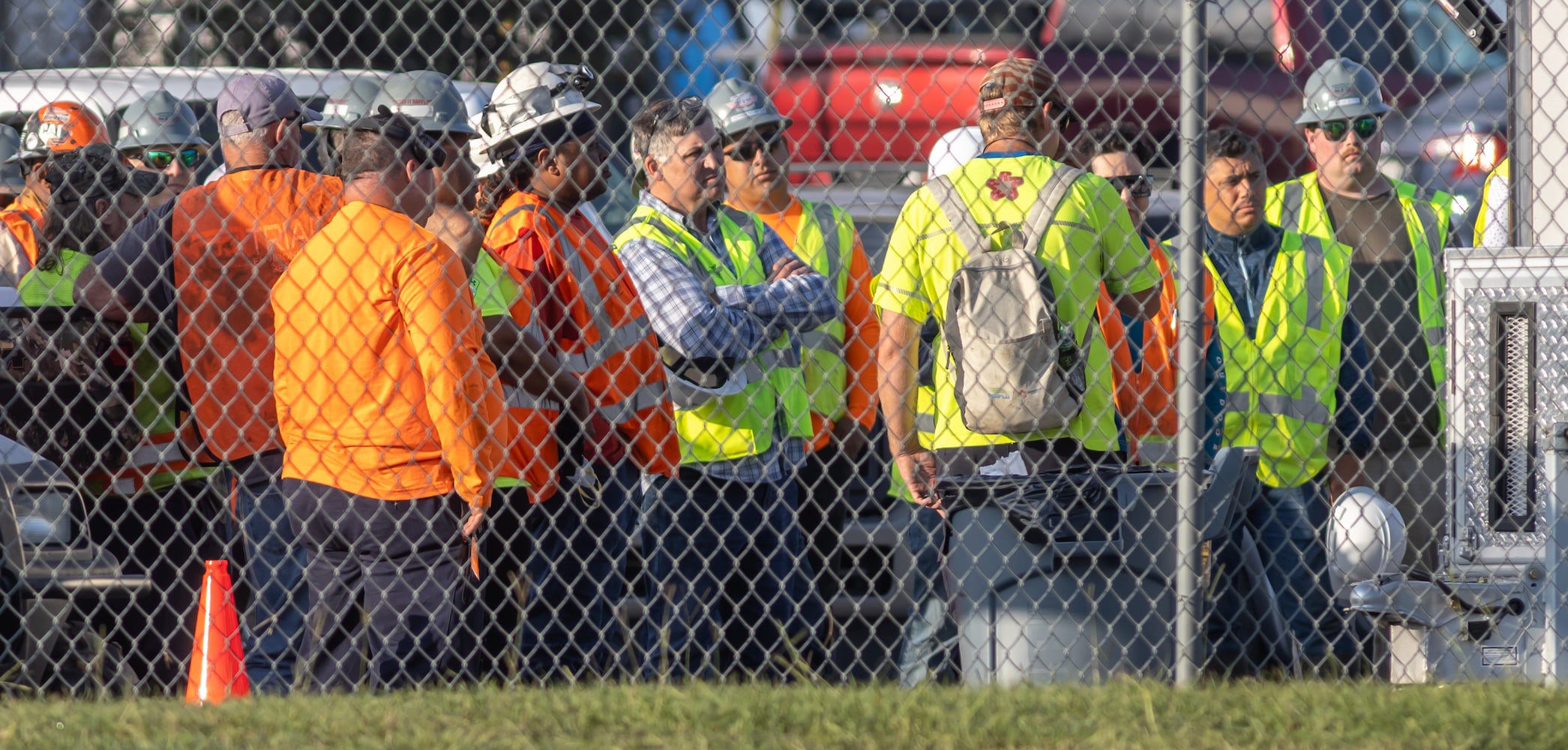 Workers at BioLab continued to work around the clock as the plume of smoke continued rising on Thursday, Oct. 3, 2024 in Conyers. A Sunday fire at the chemical plant in Conyers has had agencies monitoring the air quality since then as crews try to neutralize the site. Rockdale County officials said that the plume is changing colors as workers remove debris. GEMA has advised anyone who notices a chlorine odor in the air to limit their time outdoors. (John Spink/AJC)