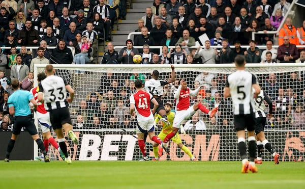 Newcastle United's Alexander Isak scores his side's first goal of the game, during the English Premier League soccer match between Newcastle United and Arsenal, at St James' Park, in Newcastle, England, Saturday, Nov. 2, 2024. (Owen Humphreys/PA via AP)