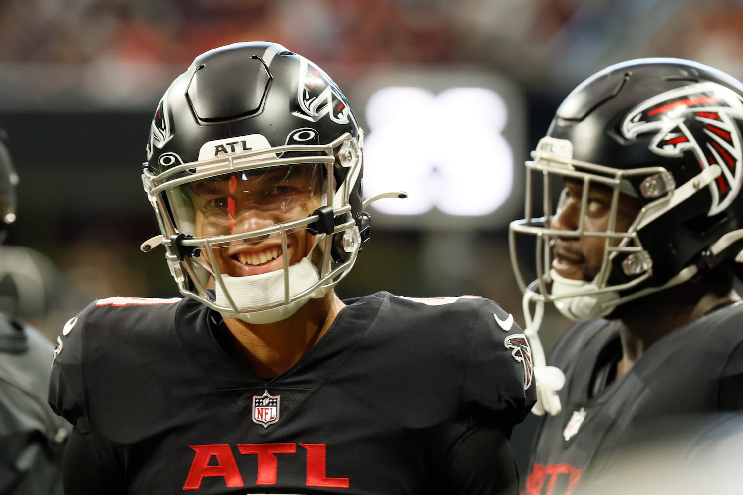 Atlanta Falcons' quarterback Desmond Ridder (4) smiles on the sideline during the second half of an NFL exhibition game against the Jacksonville, Jaguars on Saturday, August 27, 2022, at the Mercedes-Benz Stadium in Atlanta, Ga.
 Miguel Martinez / miguel.martinezjimenez@ajc.com