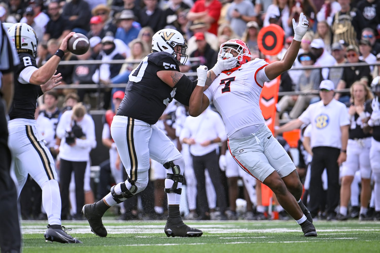 Georgia linebacker Marvin Jones Jr. (7) is blocked by Vanderbilt offensive lineman Bradley Ashmore (50) during the second half of an NCAA football game against Vanderbilt, Saturday, Oct. 14, 2023, in Nashville, Tenn. Georgia won 37-20. (Special to the AJC/John Amis)