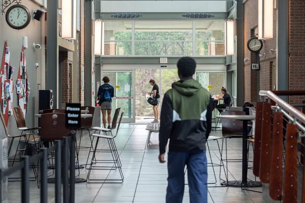 East Georgia State College students walk through the campus student center during lunch in Swainsboro, Georgia, on March 28, 2022. Since enrollment is down and many students are opting to take classes virtually, the lines for lunch are not very long and the student center is nearly empty. (Stephen B. Morton for The Atlanta Journal-Constitution)