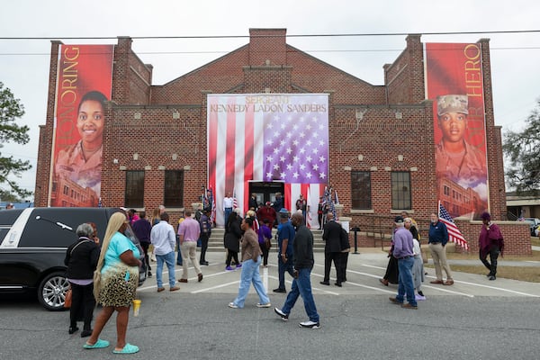 Mourners lineup outside before the start of the visitation of Army Reservist Sgt. Kennedy L. Sanders at C.C. McCray City Auditorium, Friday, February 16, 2024, in Waycross, Ga. Sgt. Sanders was killed in a drone attack in late Jan. 28th in Jordan. (Jason Getz / jason.getz@ajc.com)