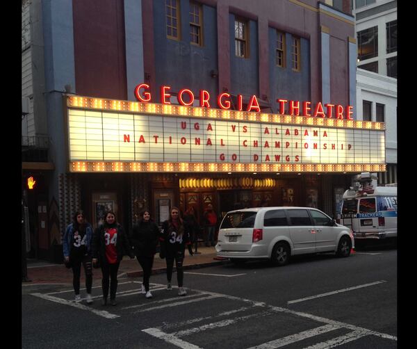 Students cross in front of the Georgia Theatre on their way to one of the local hangouts.  Photo Credit: Victoria R. Knight