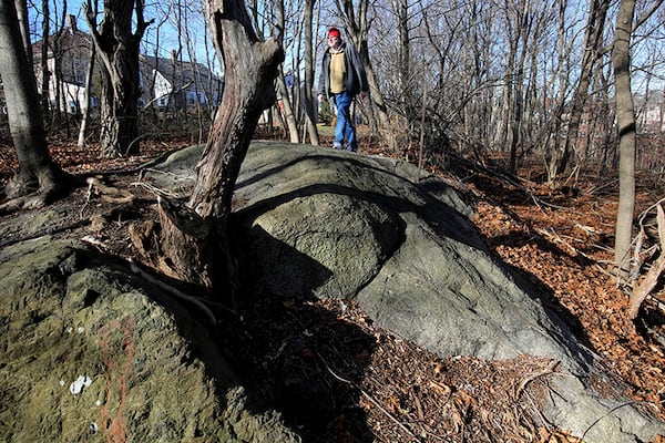 Salem State University history professor Emerson Baker walks through an area that he and a team of researchers said is the  site where 19 innocent people were hanged during the 1692 witch trials in Salem, Mass.