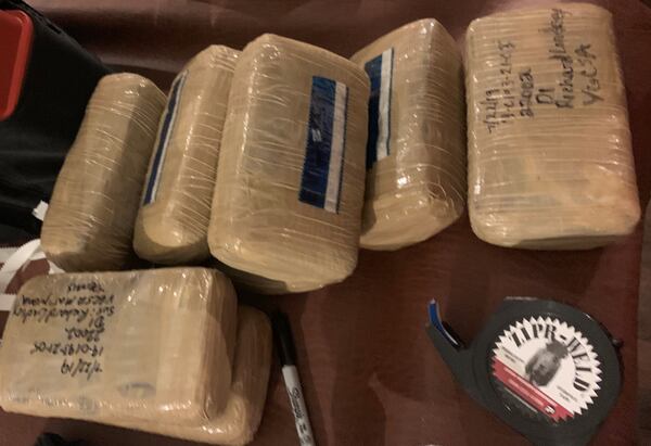 More than 10 pounds of methamphetamine and nine pounds of marijuana was recovered from the house, the sheriff's office said.