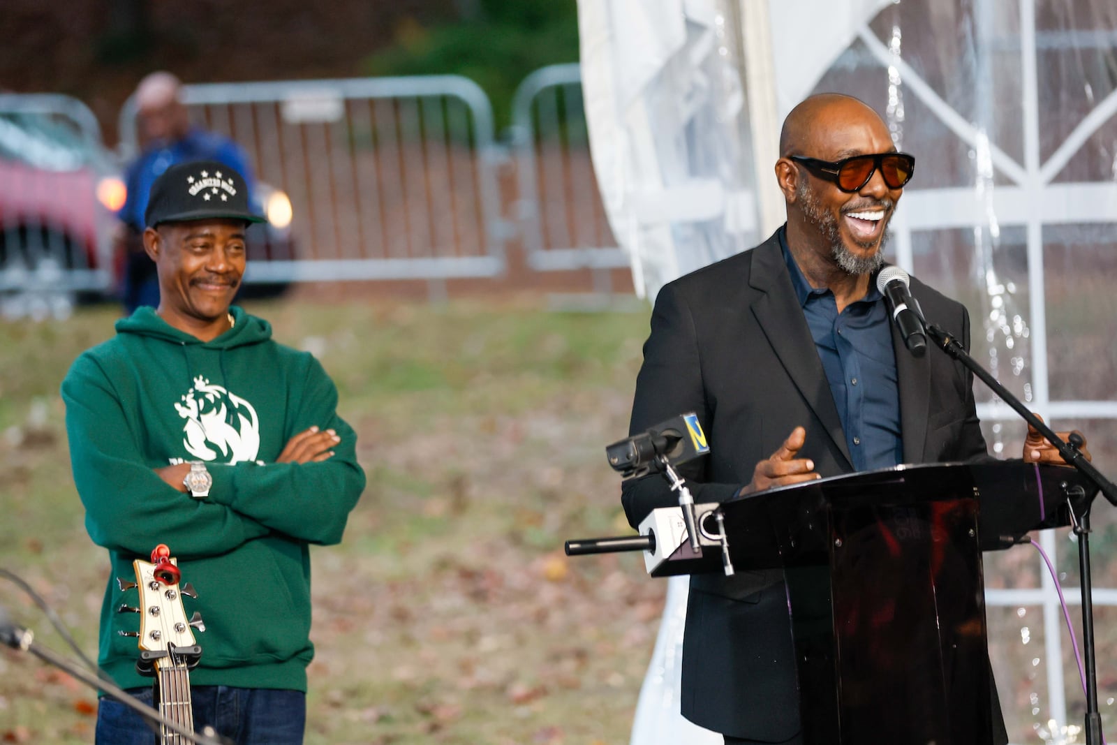 Organized Noize member Sleppy Brown smiles as Ray Murray looks as he speaks during the celebrations of the life and legacy of Rico Wade in Esat Point on Thursday, Nov. 7, 2024. 
(Miguel Martinez / AJC)