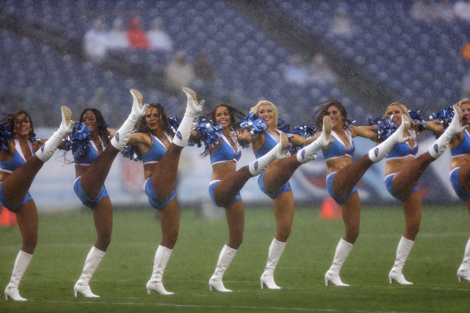 NFL cheerleaders perform at preseason games