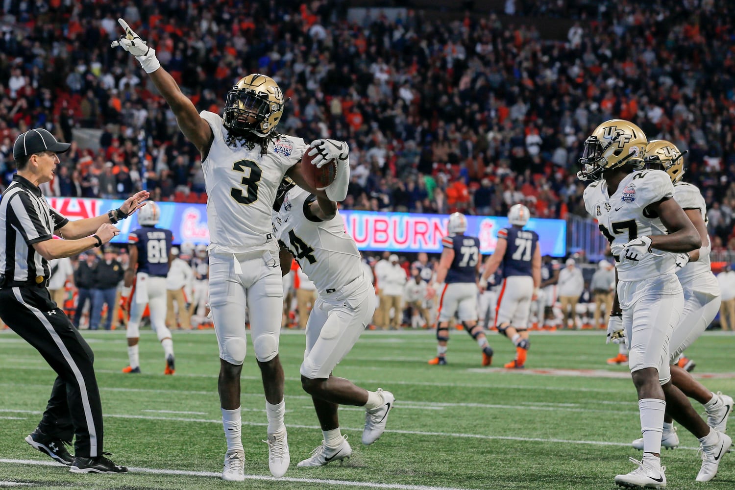 Photos: Auburn and UCF square off in Chick-fil-A Peach Bowl