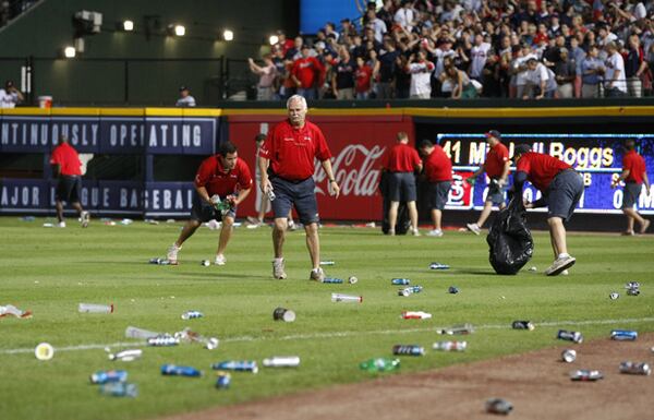 Oct. 5 -- Braves fans launched a flurry of bottles and other items to the field to protest a ruling by left-field umpire Sam Holbrook in the eighth inning of the Wild Card play-in game against the St. Louis Cardinals at Turner Field. The ruling on Andrelton Simmons’ pop-up, which landed 60 feet into left field, put a halt to a Braves rally while trailing 6-3. The crushing 6-3 loss to St. Louis in the Wild Card game also marked Chipper Jones' final game as a Brave.