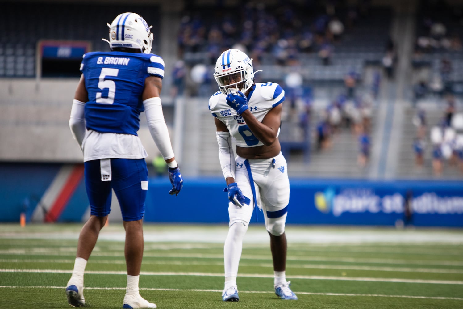 Jacob Freeman (right) lines up against Bryquice Brown. CHRISTINA MATACOTTA FOR THE ATLANTA JOURNAL-CONSTITUTION