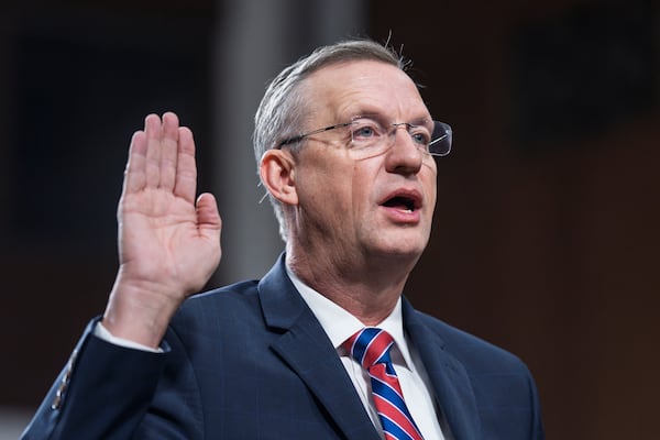 Doug Collins, President Donald Trump's pick to be Secretary of the Department of Veterans' Affairs, is sworn-in to testify at his confirmation hearing before the Senate Veterans' Affairs Committee, at the Capitol in Washington, Tuesday, Jan. 21, 2025. (AP Photo/J. Scott Applewhite)