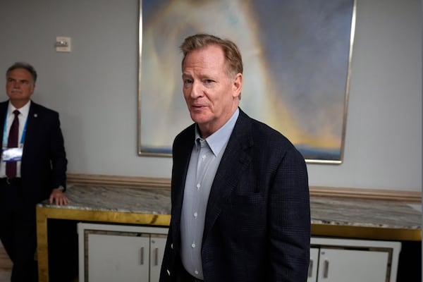 NFL Commissioner Roger Goodell walks in a hallway at the NFL football owners meeting, Wednesday, Dec. 11, 2024, in Irving, Texas. (AP Photo/LM Otero)