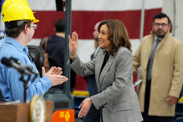 Democratic presidential nominee Vice President Kamala Harris greets employees after speaking at the Hemlock Semiconductor Next-Generation Finishing facility in Hemlock, Mich., Monday, Oct. 28, 2024. (AP Photo/Jacquelyn Martin)