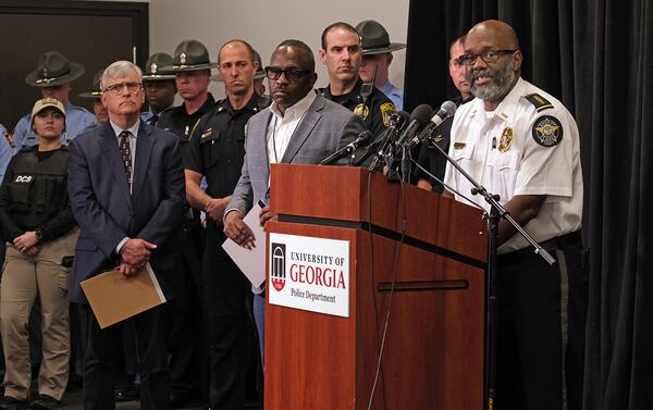 Athens-Clarke County Sheriff John Williams (right) speaks about the death of a student on the campus of the University of Georgia last week.