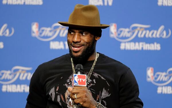 Cleveland Cavaliers forward LeBron James (23) answers a question during a press conference following Game 3 of basketball's NBA Finals in Cleveland, early Wednesday, June 10, 2015. (AP Photo/Tony Dejak)