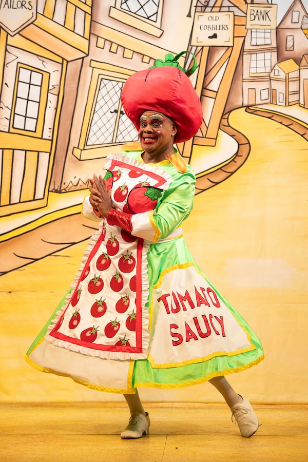 Clive Rowe as Dame Sarah the Cook poses on stage during a photocall for Hackney Empire's 25th pantomime, Dick Whittington and His Cat, in London, Tuesday, Dec. 3, 2024. (AP Photo/Thomas Krych)